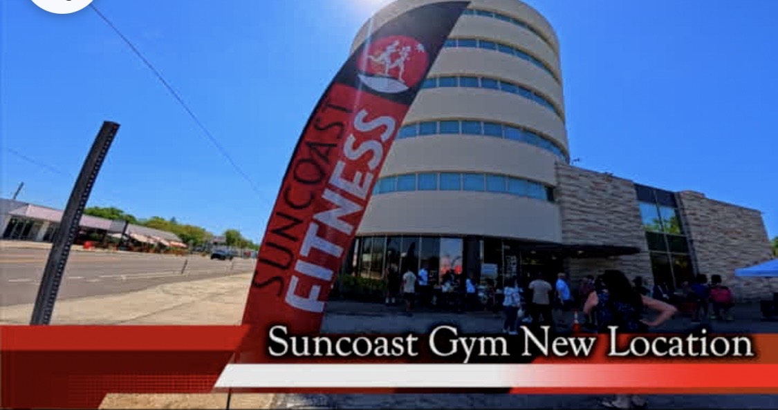 Suncoast Fitness new location with members gathered outside